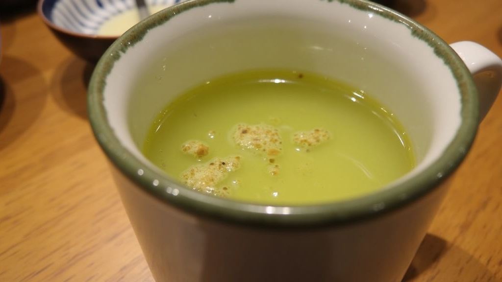 Genmaicha brewed in a mug on a table